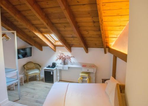 Postel nebo postele na pokoji v ubytování Les Monges Palace Boutique