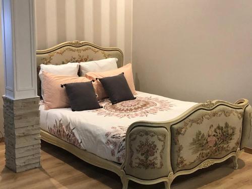 Ένα ή περισσότερα κρεβάτια σε δωμάτιο στο Appartement porte chartraine