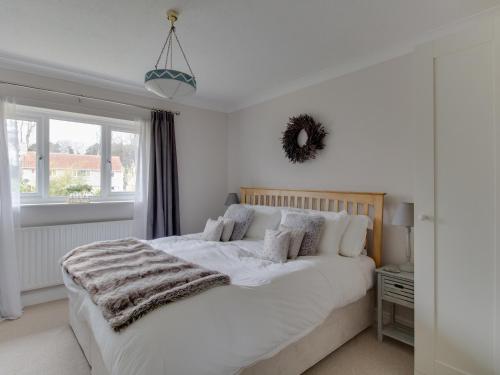 En eller flere senge i et værelse på Connaught Gardens