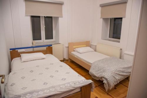 Postel nebo postele na pokoji v ubytování Siena