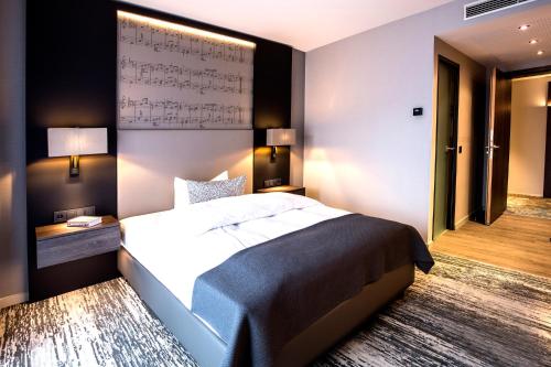 Postel nebo postele na pokoji v ubytování Kranz Parkhotel