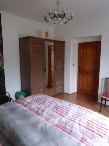 Postel nebo postele na pokoji v ubytování Apartman Ema