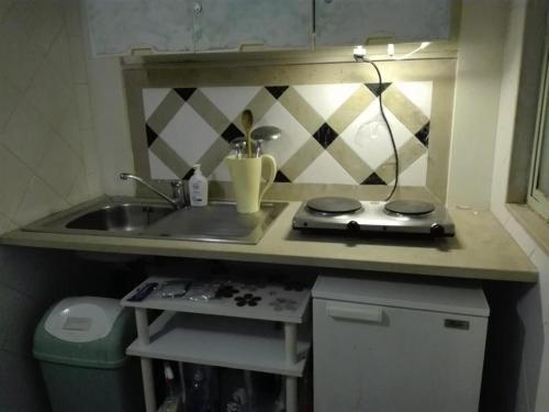 Una cocina o zona de cocina en Suite Calefati "Monolocale"