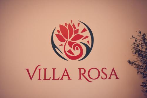 a logo for a company called villa rosa at Villa Rosa in Timişoara