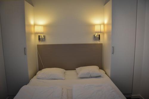 Letto o letti in una camera di Ski Lodge Funäsdalen