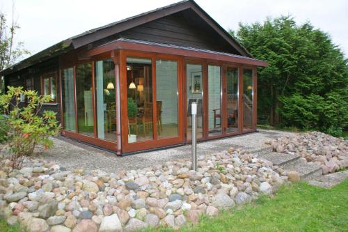 Blockhaus mit Wintergarten in Stra