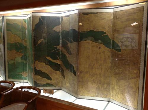 a glass shower with a painting of soldiers on the wall at Chikurinin Gunpoen in Yoshino