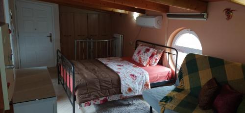 Postel nebo postele na pokoji v ubytování SeaSide Apartment Rio