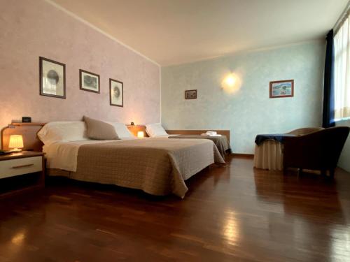 Ein Bett oder Betten in einem Zimmer der Unterkunft Sole della Franciacorta - Hotel & Restaurant