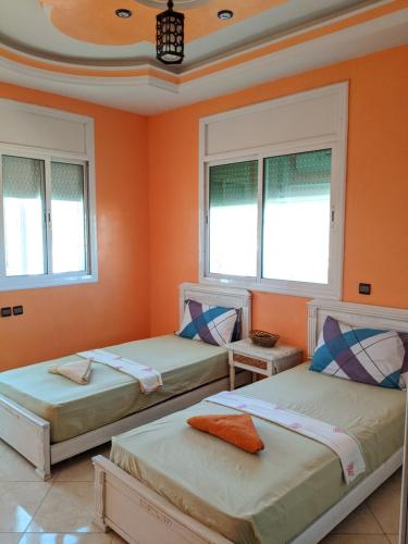 Postel nebo postele na pokoji v ubytování Full Appart Hôtel