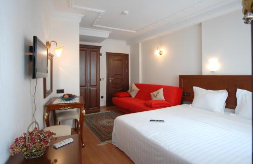 Ada Hotel Istanbulにあるベッド