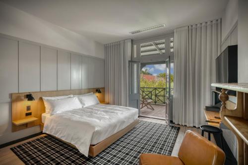 Ένα ή περισσότερα κρεβάτια σε δωμάτιο στο Farmers Home Hotel