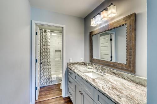 a bathroom with a sink and a mirror at Fairway Oaks 1305 in Kiawah Island