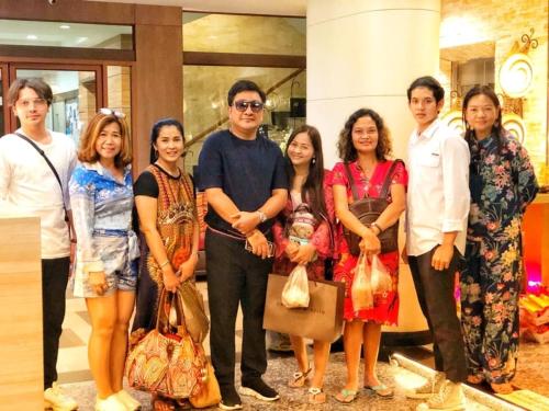a group of people posing for a picture at The Centris Hotel Phatthalung in Phatthalung
