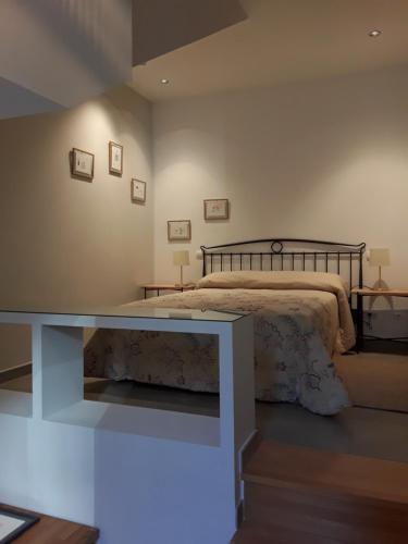 Cama o camas de una habitación en Apartamento en el Casco Histórico, frente a la Colegiata de San Isidoro,