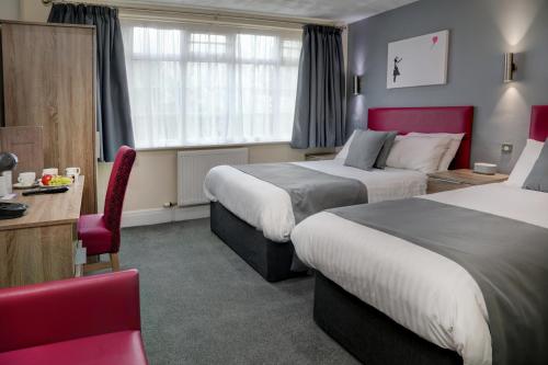 Кровать или кровати в номере Best Western Bolholt Country Park Hotel