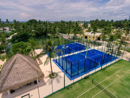 an overhead view of a tennis court at Emerald Maldives Resort & Spa-Deluxe All Inclusive in Raa Atoll
