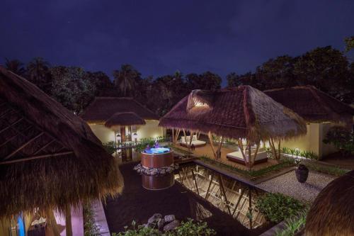 an aerial view of a resort at night at Emerald Maldives Resort & Spa-Deluxe All Inclusive in Raa Atoll