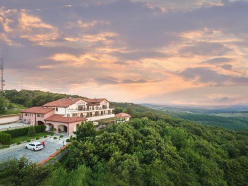an aerial view of a house on a hill at Zaara Estate Winery Hotel & SPA in Glavan