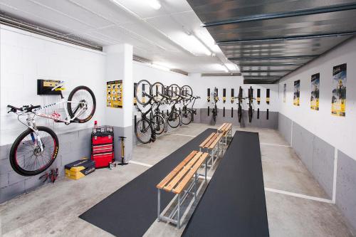 a bike shop with a bunch of bikes on the wall at Atenea Port Barcelona Mataró in Mataró
