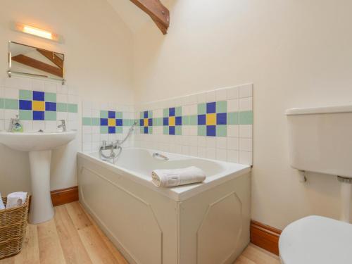 Koupelna v ubytování Fixit Cottage