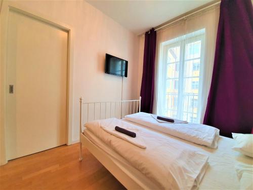 Postel nebo postele na pokoji v ubytování Apartment Sophia