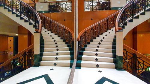 a spiral staircase in a building at The Orchid Hotel Mumbai Vile Parle in Mumbai