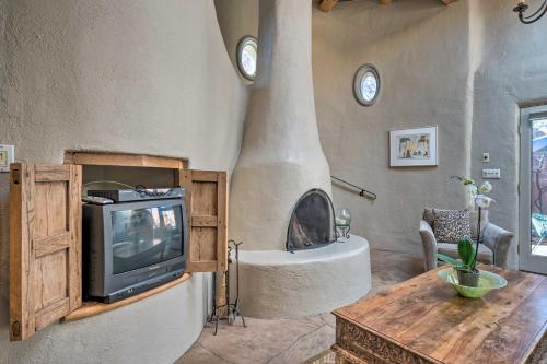 A television and/or entertainment centre at Chic Adobe-Style Bungalow in Historic Santa Fe!