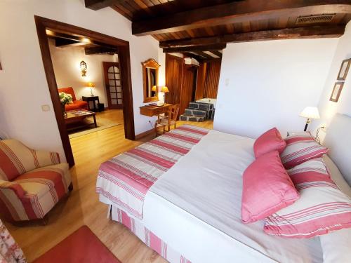 Ένα ή περισσότερα κρεβάτια σε δωμάτιο στο Hotel Kenia Nevada