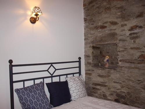 Postel nebo postele na pokoji v ubytování Casa Aigra