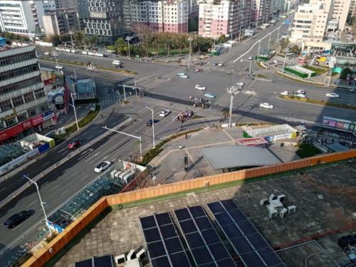 a view of a city street with cars on the road at Demei Boutique Hotel in Kunming