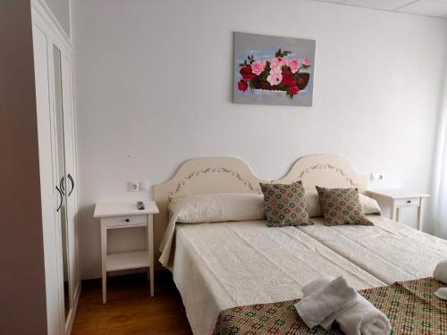 Postel nebo postele na pokoji v ubytování Lar do Peregrino
