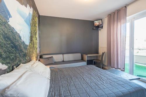 Postel nebo postele na pokoji v ubytování Hotel Rubino