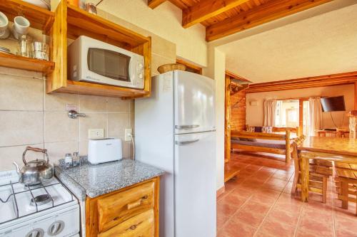 Kuchyň nebo kuchyňský kout v ubytování Punto Bariloche