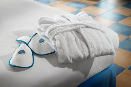 Katil atau katil-katil dalam bilik di Elba Carlota Beach & Golf Resort