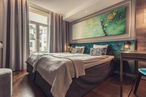Postel nebo postele na pokoji v ubytování Hotel Poseidon