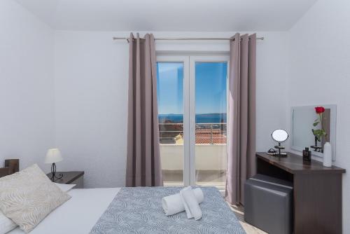 Katil atau katil-katil dalam bilik di Bilin san apartments