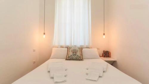 Ένα ή περισσότερα κρεβάτια σε δωμάτιο στο Secret garden in the heart of Isola
