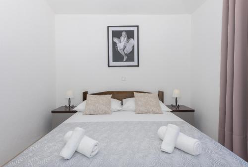 Katil atau katil-katil dalam bilik di Bilin san apartments