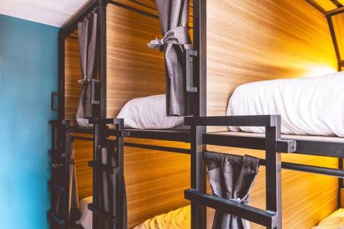 Postel nebo postele na pokoji v ubytování Bendito Hostels