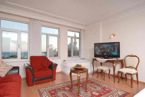 Ada Hotel Istanbulにあるテレビまたはエンターテインメントセンター