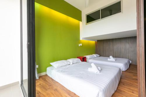 Katil atau katil-katil dalam bilik di Urban Cottage@Midhill Genting Highlands (Free Wi-Fi)