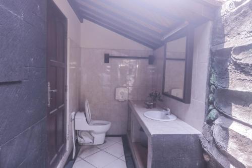 Un baño de Trijaya Guest House Pemuteran