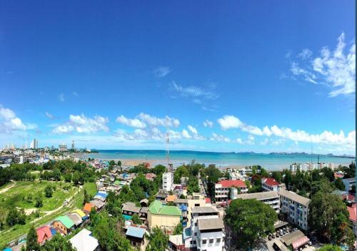 an aerial view of a city with the ocean at Ruenthip Pattaya in Pattaya North