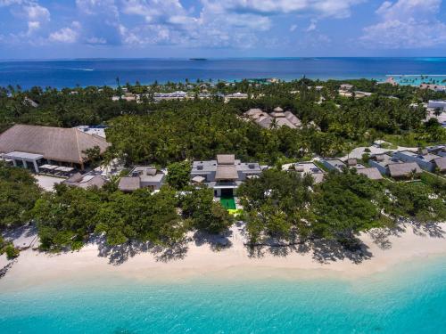 an aerial view of a resort on a tropical island at Emerald Maldives Resort & Spa-Deluxe All Inclusive in Raa Atoll