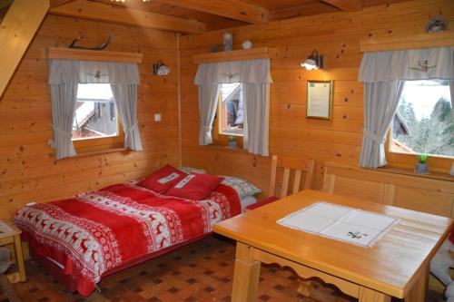 Ένα ή περισσότερα κρεβάτια σε δωμάτιο στο Shepherds House "Alpine Dreams"