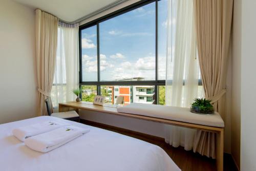 Imagen de la galería de Hill Myna Condotel, en Bang Tao Beach