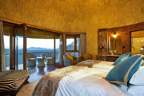 Katil atau katil-katil dalam bilik di Desert Hills Lodge