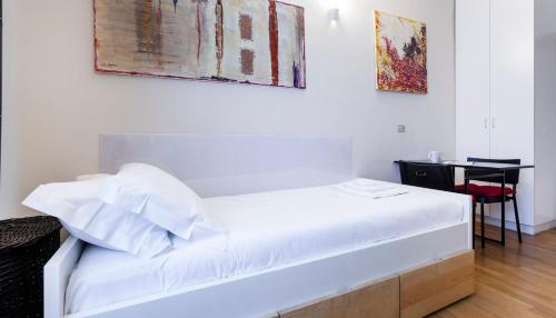 Кровать или кровати в номере Italianway - Maroncelli 14