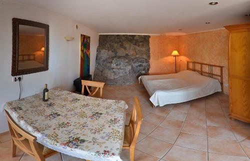 Postel nebo postele na pokoji v ubytování Finca La Tosca